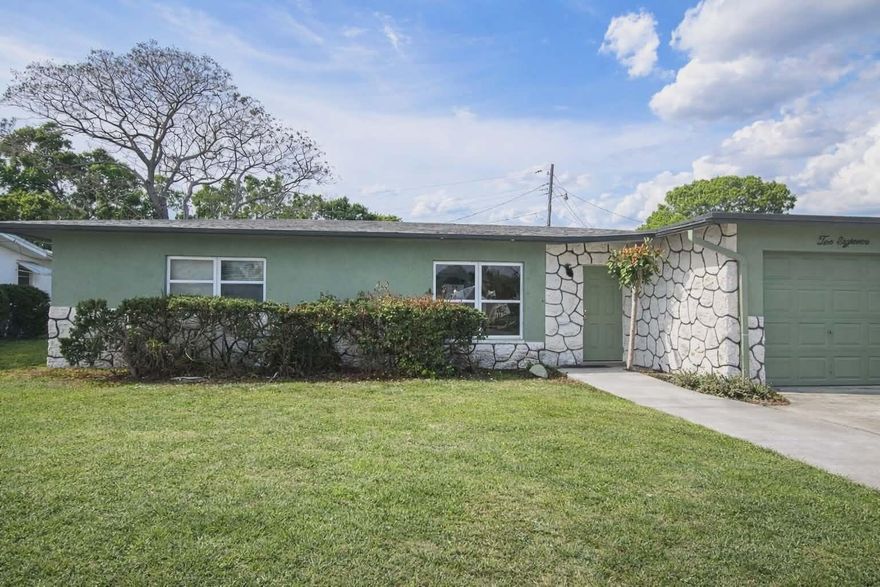 This solid 2 bedroom, 2 bathroom CBS home is situated on a generous lot in a desirable location conveniently located close to shopping, dining and Florida beaches. This home is ideal for a first-time buyer, downsizer, seasonal resident, or investor.

The interior offers tile flooring throughout, a bright living and dining area combo, plus a large family room off the kitchen, providing plenty of space for entertaining and everyday living. Enjoy outdoor relaxation in the screened-in patio, perfect for Florida living. Additional highlights include a laundry room under air, 1-car garage with abundant storage, and a functional layout designed for comfort and convenience.