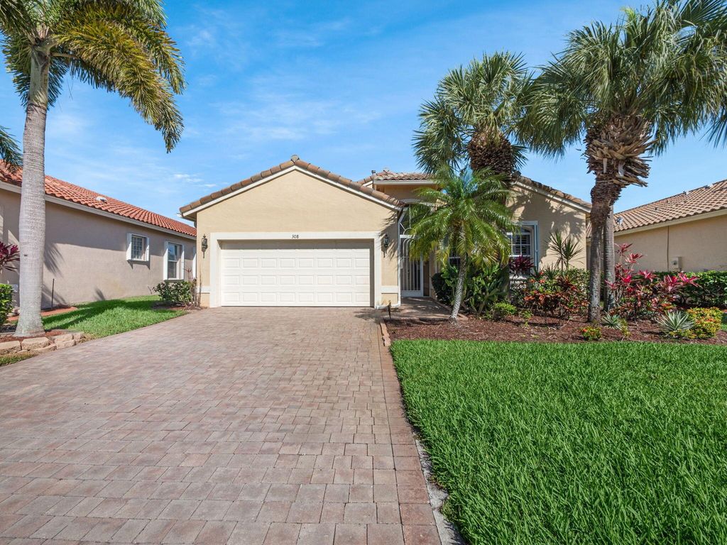 Photo of 308 NW Shoreline Circle, Port Saint Lucie, FL 34986 (MLS # R10986113)