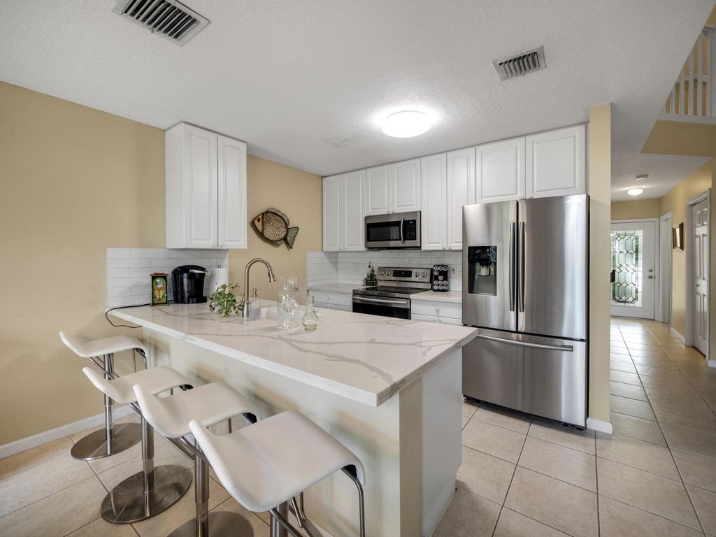 Photo of 12806 Woodmill Drive, Palm Beach Gardens, FL 33418 (MLS # R10936442)