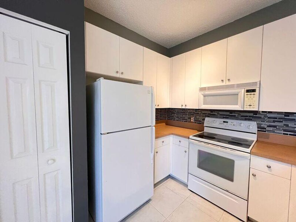 Photo of 117 Lighthouse Circle #J, Tequesta, FL 33469 (MLS # R11101078)