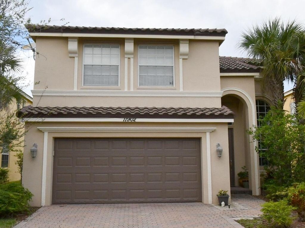Photo of 11902 SW Knightsbridge Lane, Port Saint Lucie, FL 34987 (MLS # B26009389)