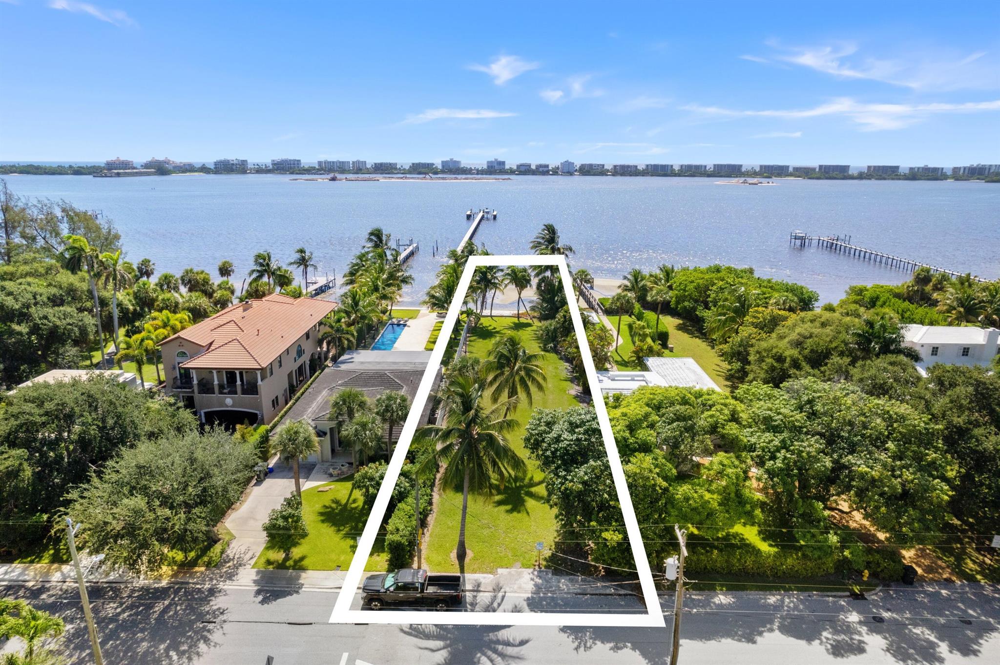 Build ready lot overlooking Palm Beach Island with NO HOA.A rare opportunity to build your dream home with direct views of iconic Palm Beach Island. This cleared and level lot comes with plans, making it truly shovel ready. Wake up to breathtaking sunrises daily, enjoy the freedom of no HOA, and bring your boat you're just moments from the Ocean. Whether you're an end user or investor, this is a turnkey opportunity in one of the most desirable coastal corridors in South Florida.
