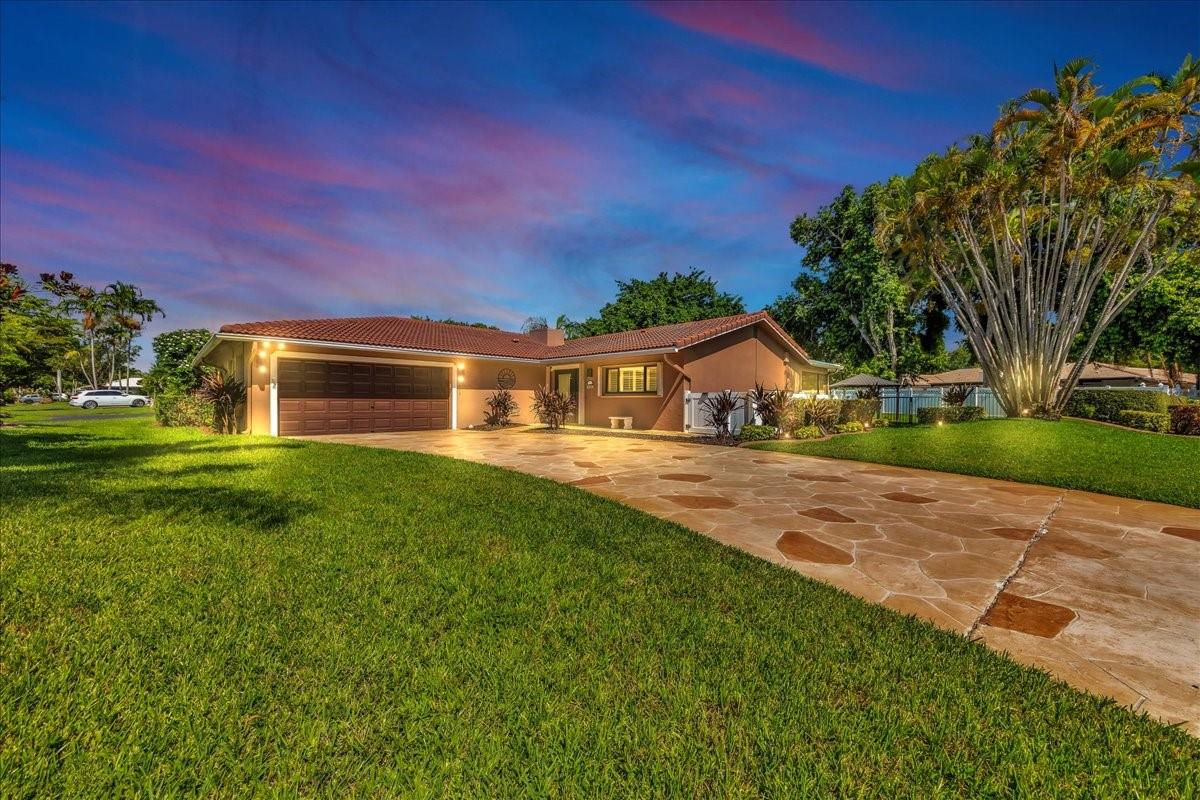 Stunning 4 beds (+ DEN), 2 baths, 2.5 car garage home situated in a spacious corner lot with endless possibilities! This beautifully maintained and upgraded home offers a large living area, formal living, dining, and family rooms. The open kitchen boasts granite countertops, stainless steel appliances, and ample custom cabinet space. Amazing outdoor area, perfect for entertainment, features an extra large backyard with a large pool, built-in bbq, concrete shed, and covered patio with wet bar, ideal for gatherings or future expansion. The pool also has an automated sunset cover for those hot Florida days and a fully operational highly maintained automatic GENERATOR for hurricane season. This property has everything! Come see and fall in love.