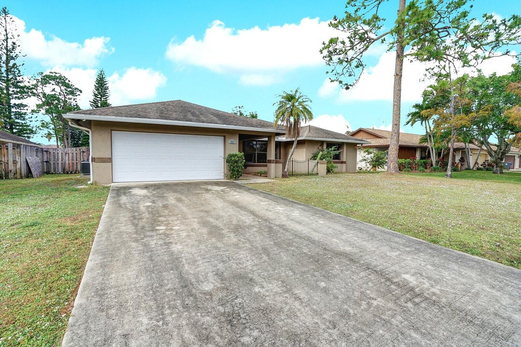 Photo of 527 Indigo Avenue, Wellington, FL 33414 (MLS # R11045954)