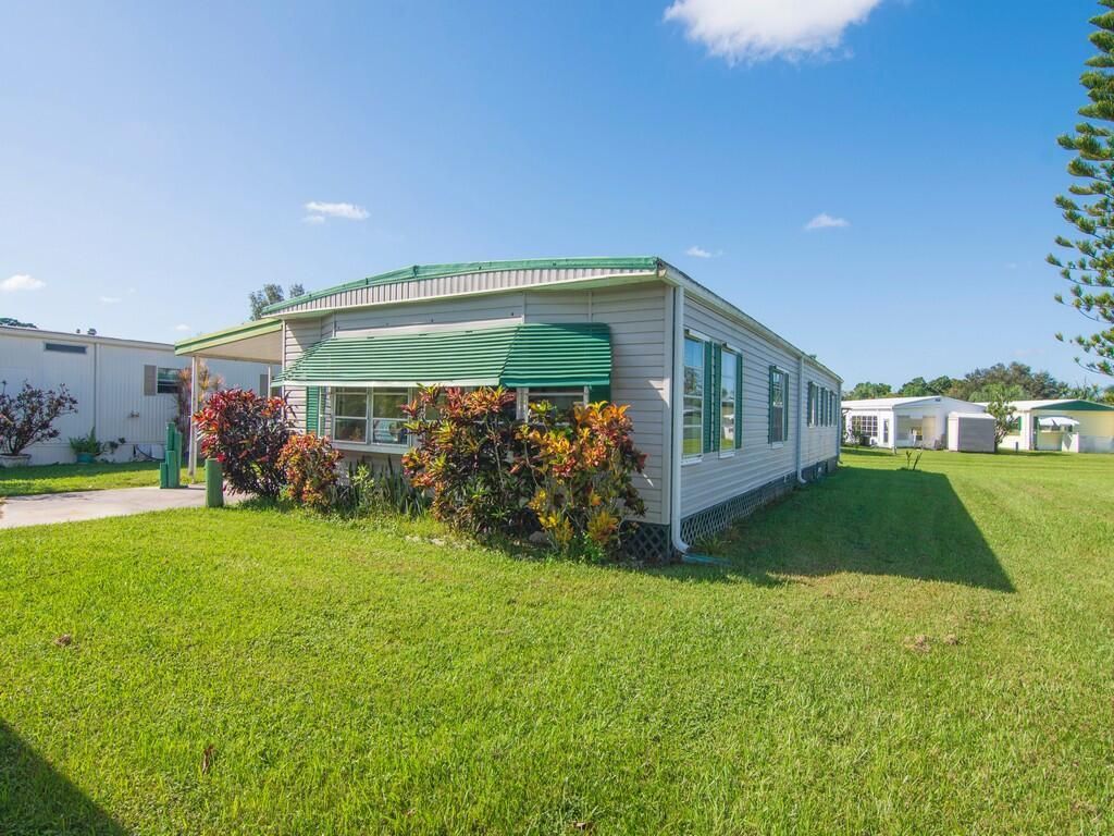 Photo of 7 Santa Fe Lane, Port Saint Lucie, FL 34952 (MLS # R10935312)