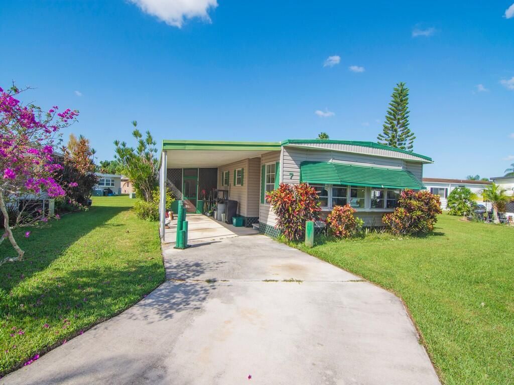 Photo of 7 Santa Fe Lane, Port Saint Lucie, FL 34952 (MLS # R10935312)