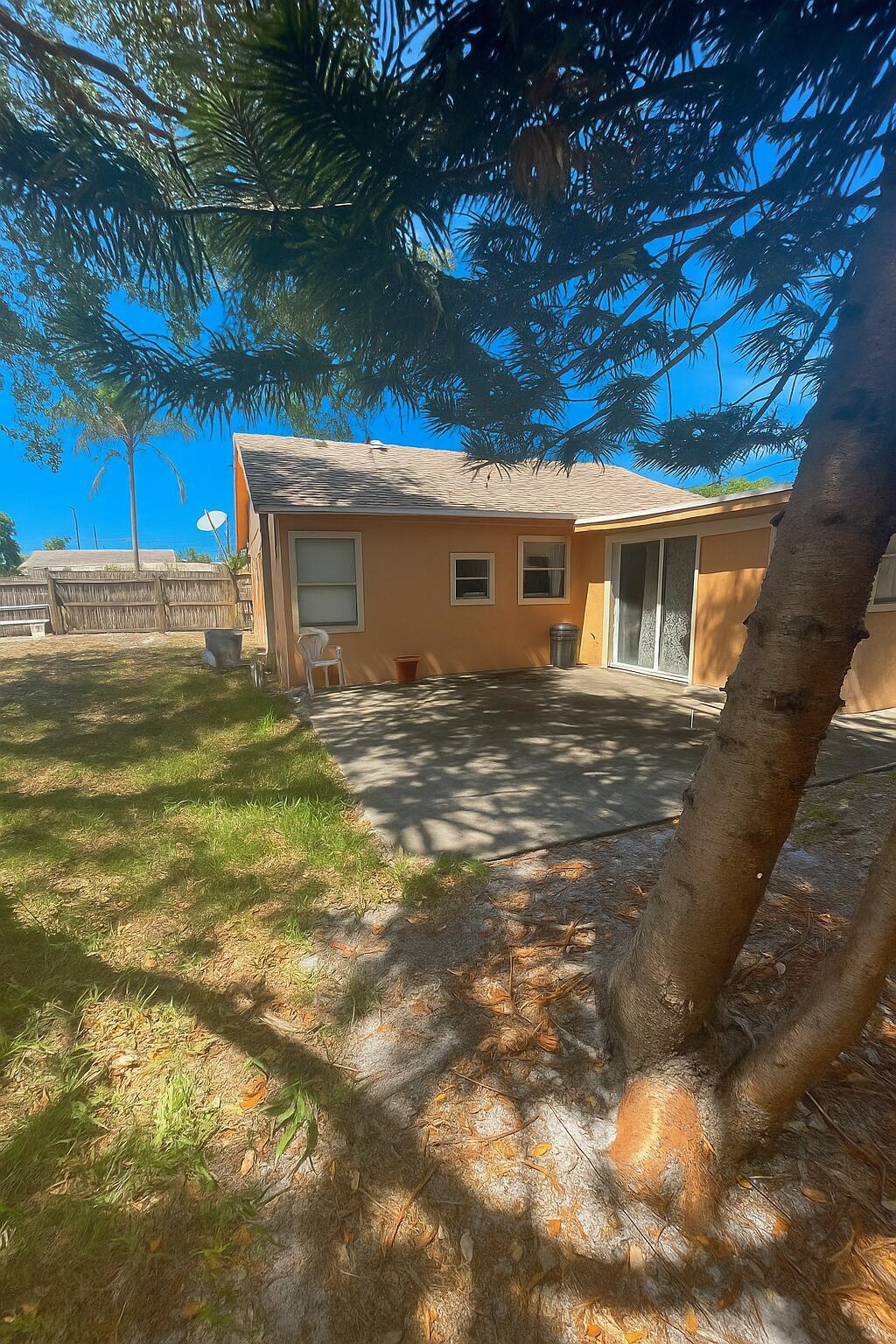Investors Alert!!!!!  Huge opportunity awaits at 410 Minnesota Street in Lantana ONLY 1.2 miles from the beach. This 1946 three-bedroom, one-bath home sits on a rare oversized lot for South Florida, offering endless potential. Zoned multi-family, the property is ideal for your next fix & flip, fix & hold as an income property, or even a tear down & rebuild project. Features include a spacious patio and a lot size that opens the door to multiple investment strategies. The home is in need of a full renovation and is truly a handyman special. Don't miss this chance to create serious value in a prime location!