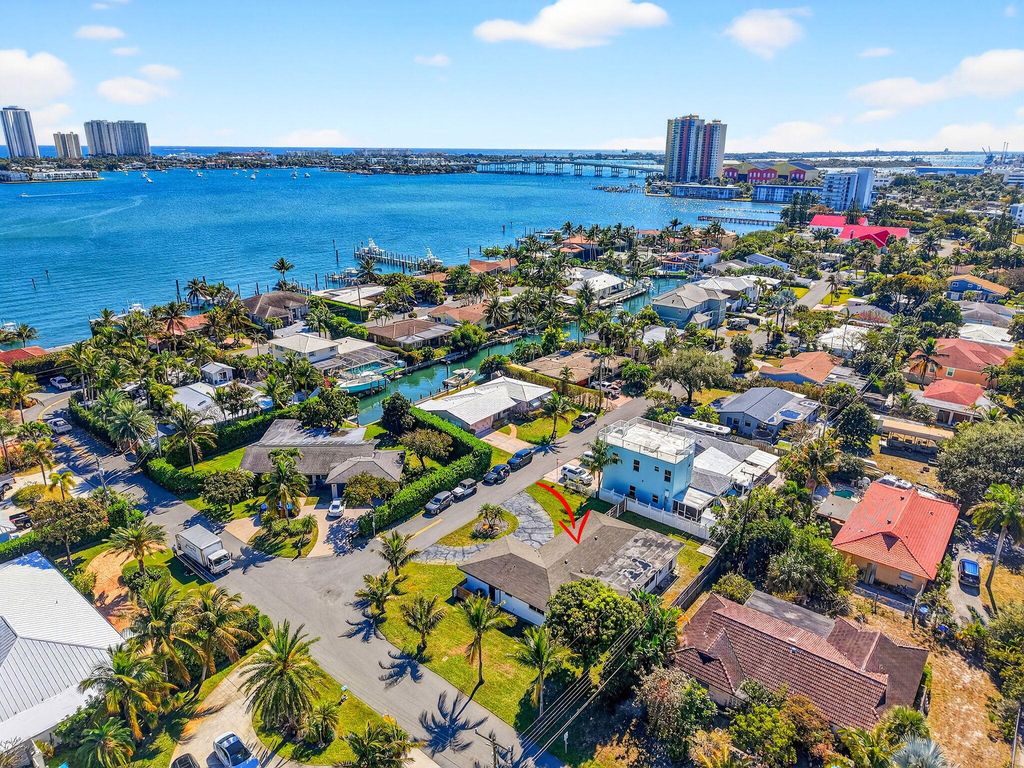 Photo of 3651 Palm Drive, Riviera Beach, FL 33404 (MLS # R11162952)