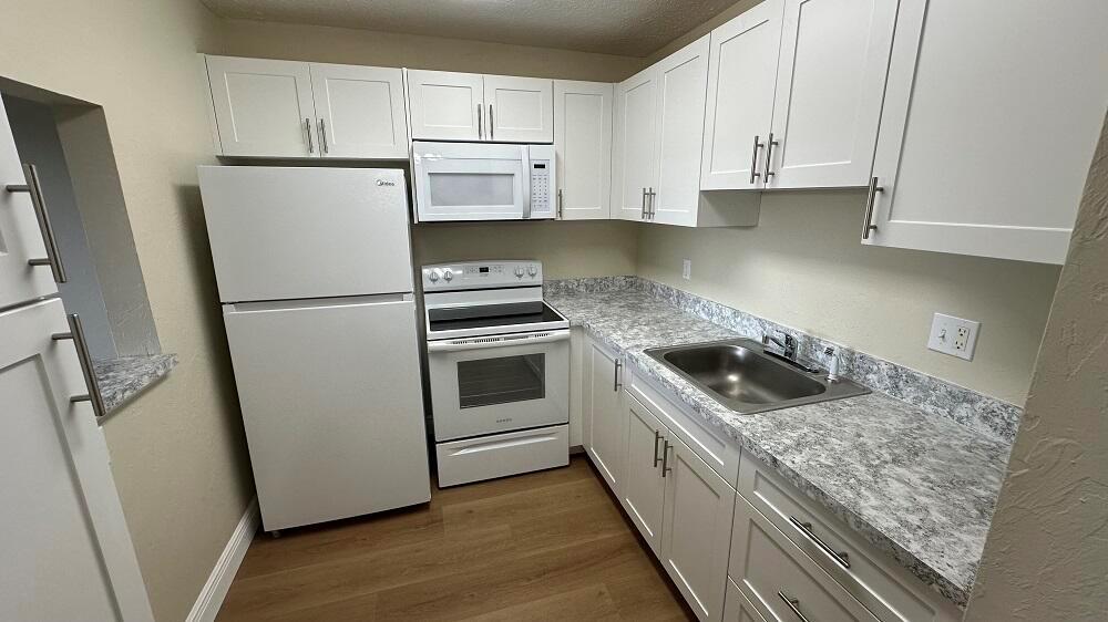 VILLAGE GREEN HAMPTON CON - Residential Lease