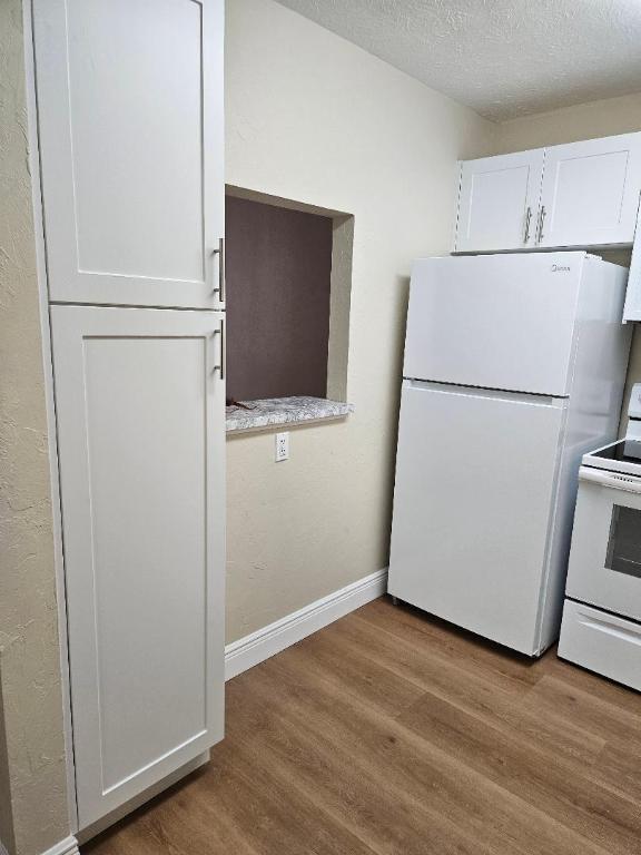 VILLAGE GREEN HAMPTON CONDO - Residential Lease