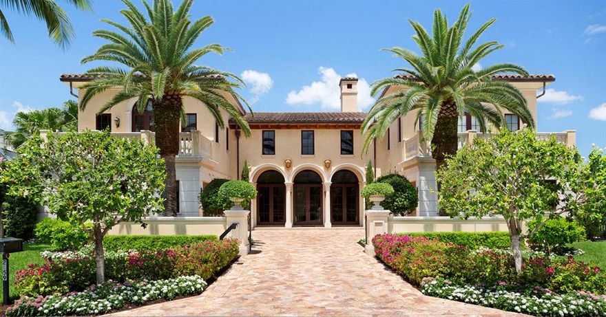 South Florida's grand tradition endures in the estate section of Boca Raton, a prestigious beachside enclave of stately waterfront residences in the timeless ambiance of a tropical oasis.  This premier estate pays homage to the past in an elegant Tuscan-inspired villa, surrounded by the tranquility of lush gardens on the Intracoastal Waterway.  Noted Boca Raton architect Rex Nichols and builder David A. Farrow originally joined forces to create this exquisite jewel, a perfection of Old World design and craftsmanship.