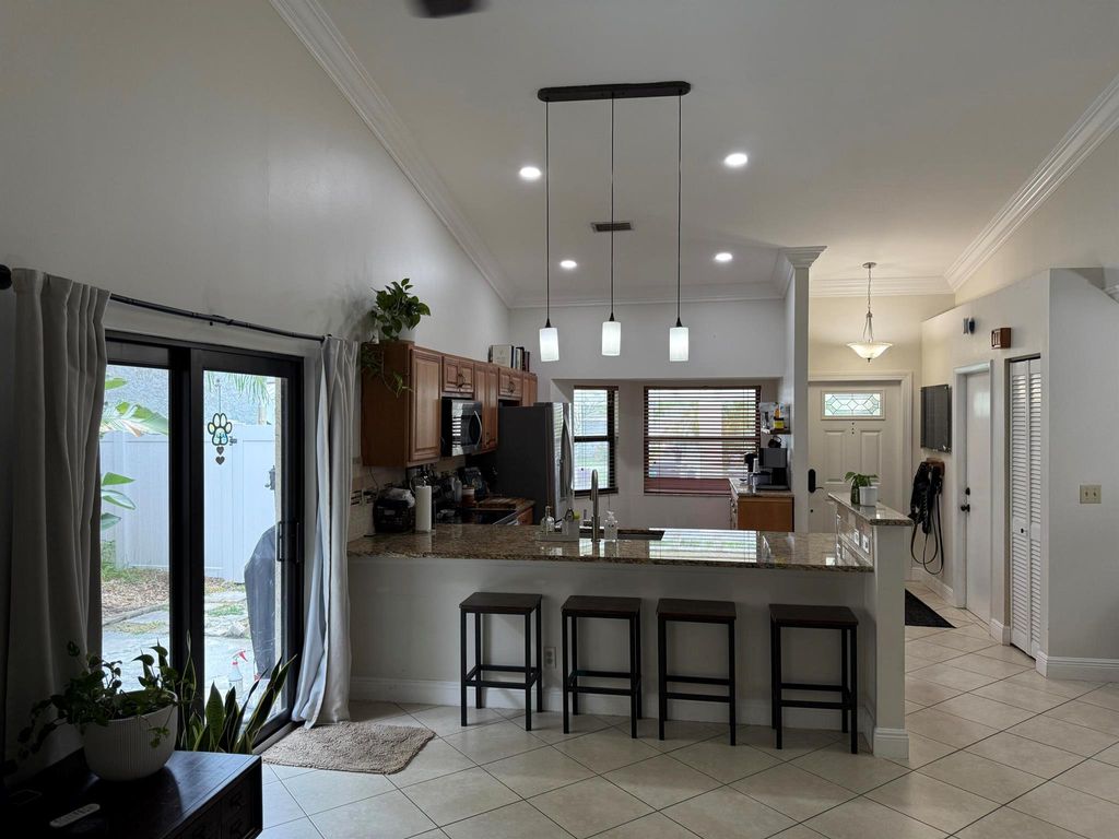 Photo of 7 Hawthorne Lane, Boynton Beach, FL 33426 (MLS # R11107603)