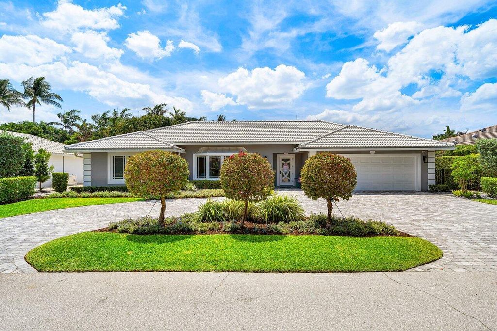 Photo of 2177 Areca Palm Road, Boca Raton, FL 33432 (MLS # B26023214)