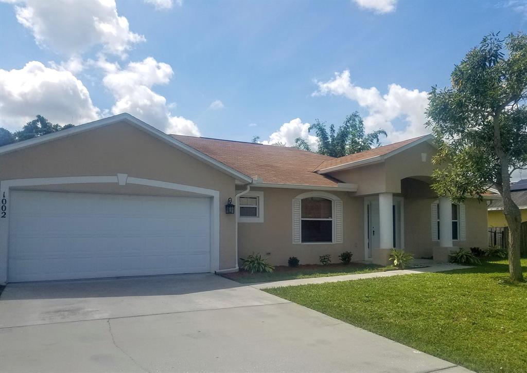 Photo of 1002 SW Mccall Road, Port Saint Lucie, FL 34953 (MLS # R10747039)