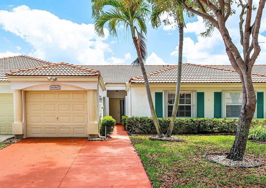 Beautiful 2BR/2BA villa in Floral Lakes, an active 55+ gated community in prime West Delray Beach! This well-maintained home offers high ceilings, recessed lighting, and a bright, open feel. Enjoy your private patio—perfect for morning coffee or evening wine. Accordion shutters provide full hurricane protection for peace of mind. Floral Lakes features a newly renovated clubhouse and resort-style amenities including 2 pools, fitness center, tennis, pickleball, bocce, billiards, and a full social calendar. Ideally located just minutes from Atlantic Ave, shopping, dining, and major highways. Pet-friendly community with immediate leasing permitted. Move-in ready and waiting for you to enjoy the Florida lifestyle! Floral Lakes is a beautifully maintained community with tree-lined streets, lush landscaping, and scenic lakes throughout. Residents enjoy a vibrant and active lifestyle with daily activities such as yoga, tai chi, and water aerobics, along with clubs, shows, and social events coordinated by an on-site social director. The recently renovated clubhouse offers a theatre, arts & crafts room with kiln, and multiple gathering spaces. HOA includes landscaping, cable, and gated security. This villa has been thoughtfully maintained with some updates and is in excellent condition, offering a great opportunity to personalize while enjoying a move-in ready home in one of Delray's most desirable 55+ communities.
