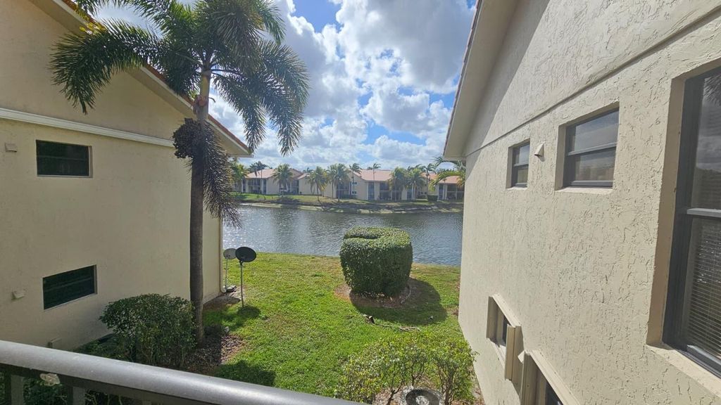 Photo of 1517 Lake Crystal Drive #E, West Palm Beach, FL 33411 (MLS # B26019031)