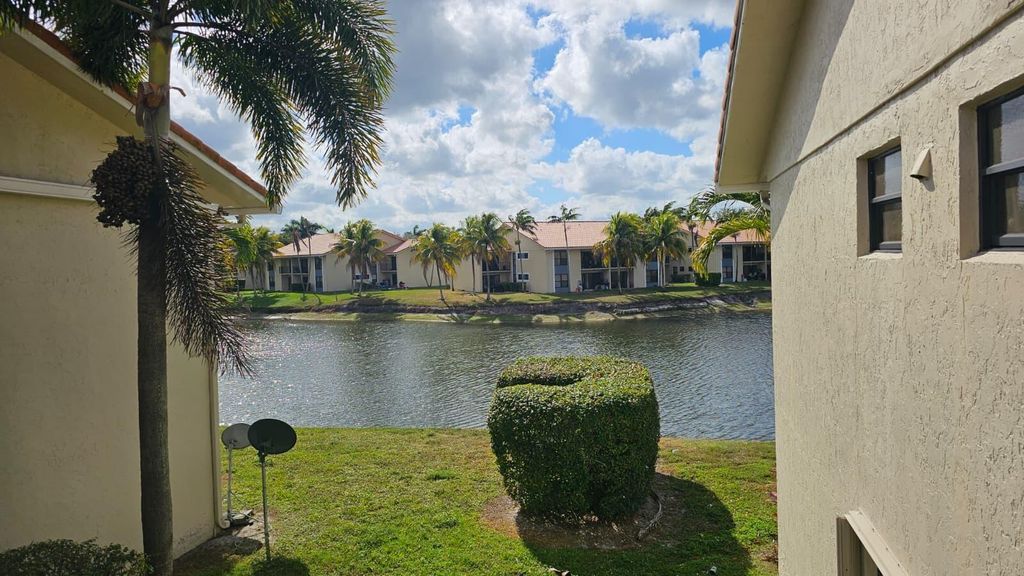 Photo of 1517 Lake Crystal Drive #E, West Palm Beach, FL 33411 (MLS # B26019031)