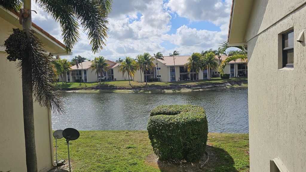 Photo of 1517 Lake Crystal Drive #E, West Palm Beach, FL 33411 (MLS # B26019031)