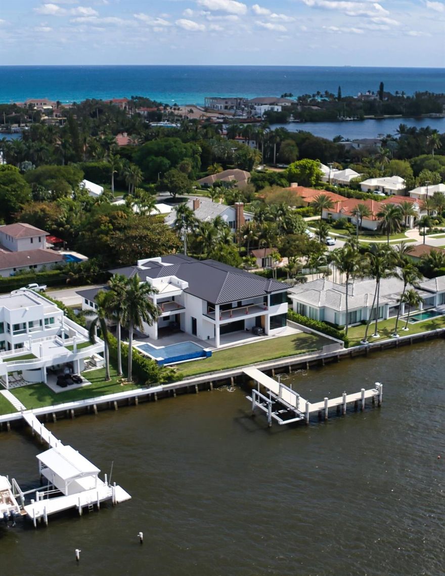 New construction estate, with 106 feet on the Intracoastal on Point Manalapan, is luxuriously appointed with premium enhancements. Inviting indoor/outdoor living, details include a wet bar and 868-bottle wine room, poolside and second-floor balconies and a third-floor observation deck that overlooks the wide Intracoastal waterway. For boaters, the 50-foot dock with a leg extension is full service with a fish station, power, and a new 25,000-pound hurricane boat​​‌​​​​‌​‌​​​‌‌​​​‌‌‌​​‌​​‌‌​​​​ lift.