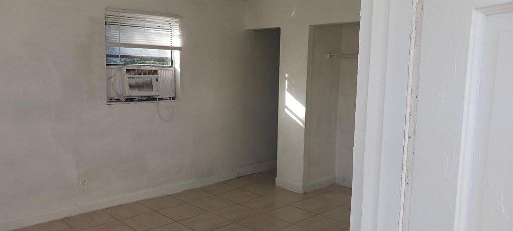 Photo of 725 N E Street, Lake Worth Beach, FL 33460 (MLS # F10542108)