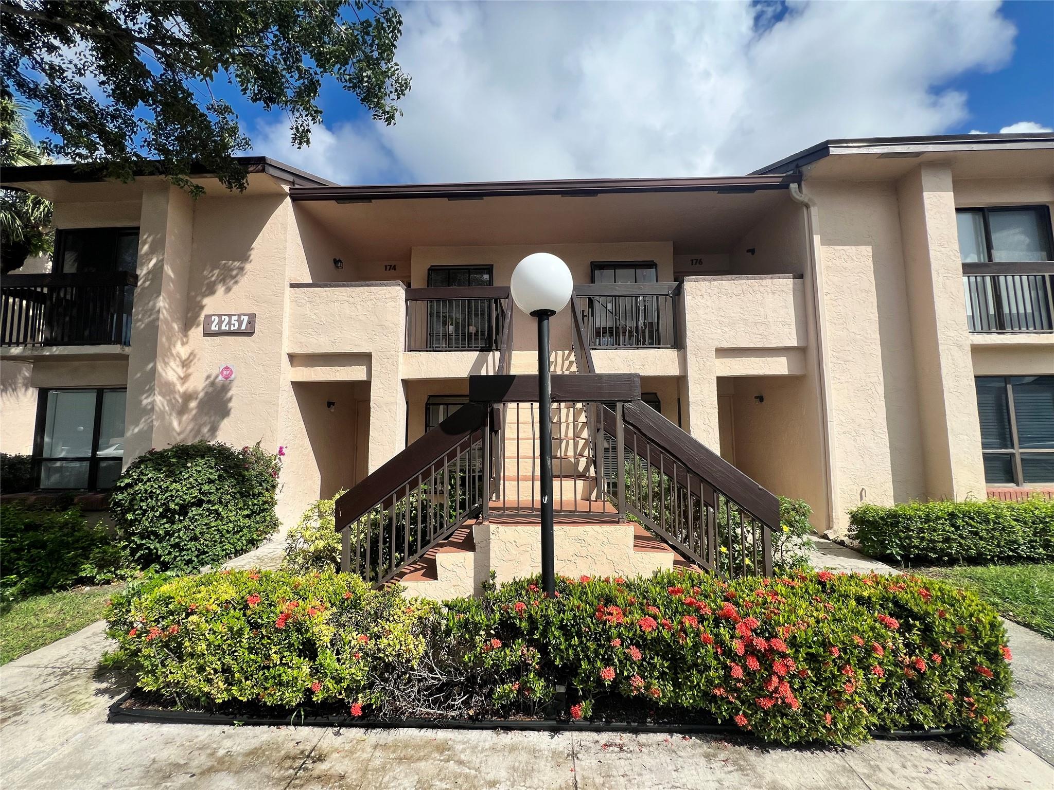 Move in just in time for the holidays. This beautifully updated first-floor condo in the heart of Deerfield Beach features elegant porcelain tile flooring, wood laminate in the bedrooms, and stunning granite countertops. The renovated master bathroom feels fresh and modern, and built-in closets offer easy organization. Enjoy the convenience of an in-unit washer and dryer and plenty of storage space throughout. Perfectly located near beaches, shopping, and dining. Available to move in December 1st.