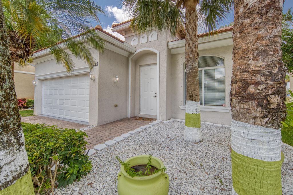 Photo of 139 Two Pine Drive, Greenacres, FL 33413 (MLS # R10983408)