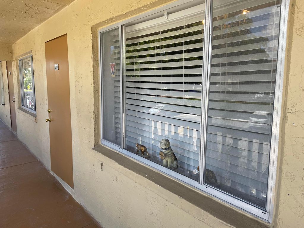 Photo of 555 Purdy Lane #203, Palm Springs, FL 33461 (MLS # R11116454)
