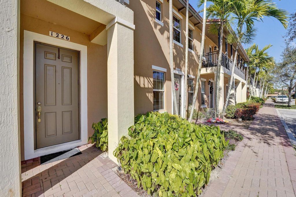 Photo of 1226 SW 147th Terrace #1226, Pembroke Pines, FL 33027 (MLS # F10549393)