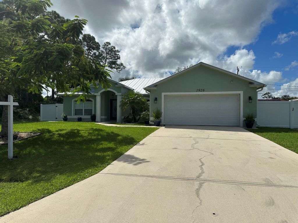Photo of 1926 SW Hillman Street, Port St Lucie, FL 34953 (MLS # R10925505)