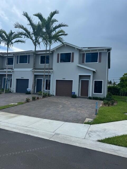 Brand New CORNER Lot Townhome .Be the first one to live in this beautiful townhome in a boutique collection of 40 Tradition Series townhomes the heart of Palm Beach. This Unit offers Stainless Steel Whirlpool Appliances with 36'' Upper Dark Wood Color Flagstone Cabinets, Quartz Kitchen Countertops with a square edge and 4'' backsplash--it includes SS undermount sink & chrome faucet. The Main Floor Tile comes with Omega White 24 x 24 Porcelain tiles, Mohawk Carpet on stairs and 2nd floor, Marble White Countertops, laundry room on 1st floor, large walk-in closets, and tankless water heater. The home is professionally landscaped, equipped with smart home technology featuring smart lighting. Easy access to most major highways ,Downtown West Palm Peach Palm Beach Airport , Outlets and Palm Be