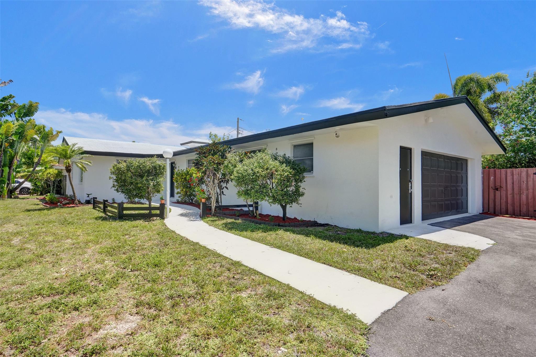 Beautifully updated single-family home in vibrant Oakland Park featuring 3 bedrooms and 3 full bathrooms on a spacious corner lot. Bright open layout with a modern kitchen, stylish baths, and new flooring throughout. Enjoy a large fenced yard, two-car garage, and tons of natural light. No HOA and investor friendly with strong rental potential. Located just minutes from Funky Buddha Brewery, downtown Oakland Park, Wilton Drive in Wilton Manors, beaches, parks, schools, and I-95. Great spot for families or anyone wanting convenience, space, and style in a growing community.