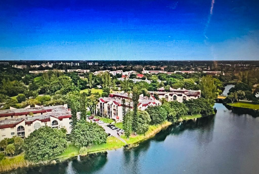 Photo of 3330 Spanish Moss Ter #406, Lauderhill, FL 33319 (MLS # B26000932)