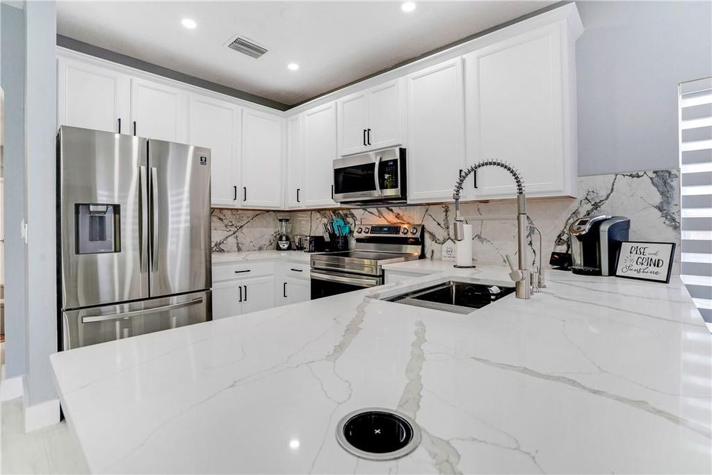 Photo of 3400 Willow Street, Lauderdale Lakes, FL 33311 (MLS # B26018270)