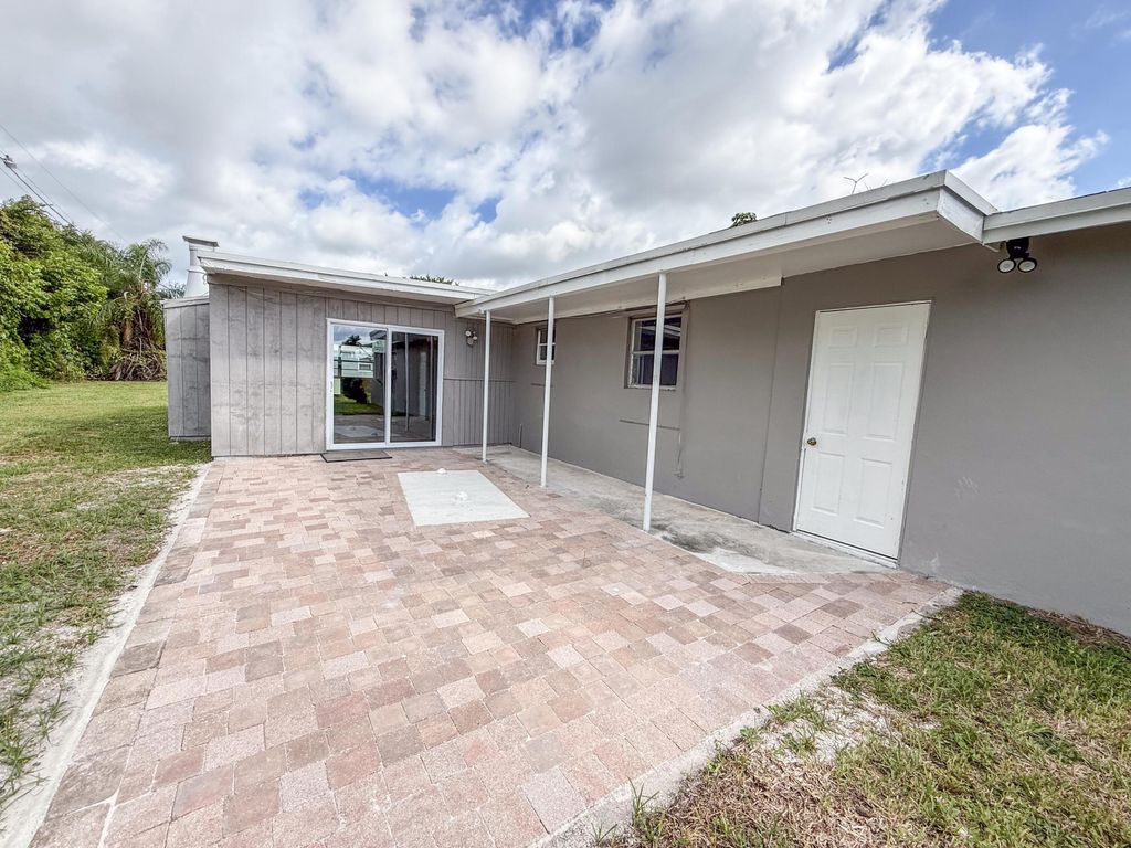 Photo of 2479 Pinecrest Court, West Palm Beach, FL 33415 (MLS # R11130387)