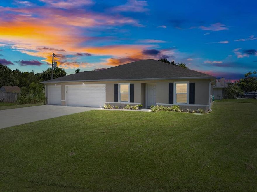 Stunning 2023 build on a spacious corner lot with a  3-car garage! This 3-bedroom, 2-bath home offers 1,552 sq. ft. of bright, open living. The flexible layout includes a formal dining area and bonus space--perfect for an office or playroom. The modern kitchen features a large countertop with bar seating, opening to the living room for seamless entertaining. The primary suite has a walk-in closet and private bath, while two additional bedrooms share a full bath. Sliding doors lead to the backyard with room for a pool. Energy-efficient construction, no HOA, and a prime location near shopping, dining, and beaches make this move-in ready home an amazing opportunity!