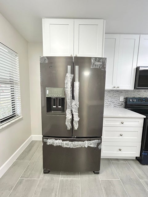 Tiny photo for 7681 Tahiti Lane #102, Lake Worth, FL 33467 (MLS # B26053312)