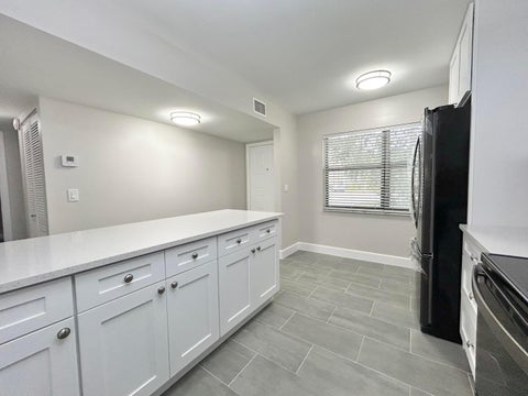 Tiny photo for 7681 Tahiti Lane #102, Lake Worth, FL 33467 (MLS # B26053312)