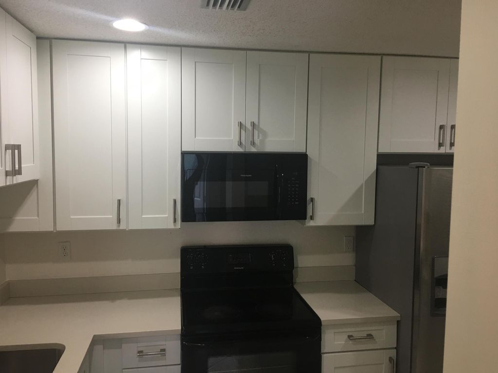Photo of 1359 Pines Lane, West Palm Beach, FL 33415 (MLS # B26019131)