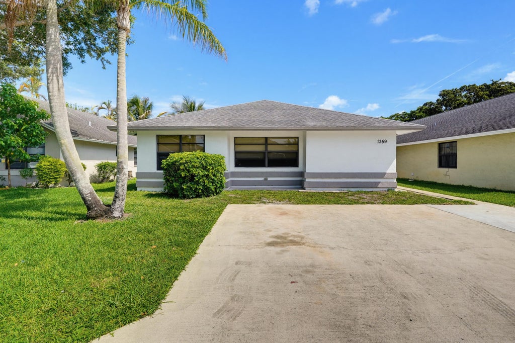 Photo of 1359 Pines Lane, West Palm Beach, FL 33415 (MLS # B26019131)