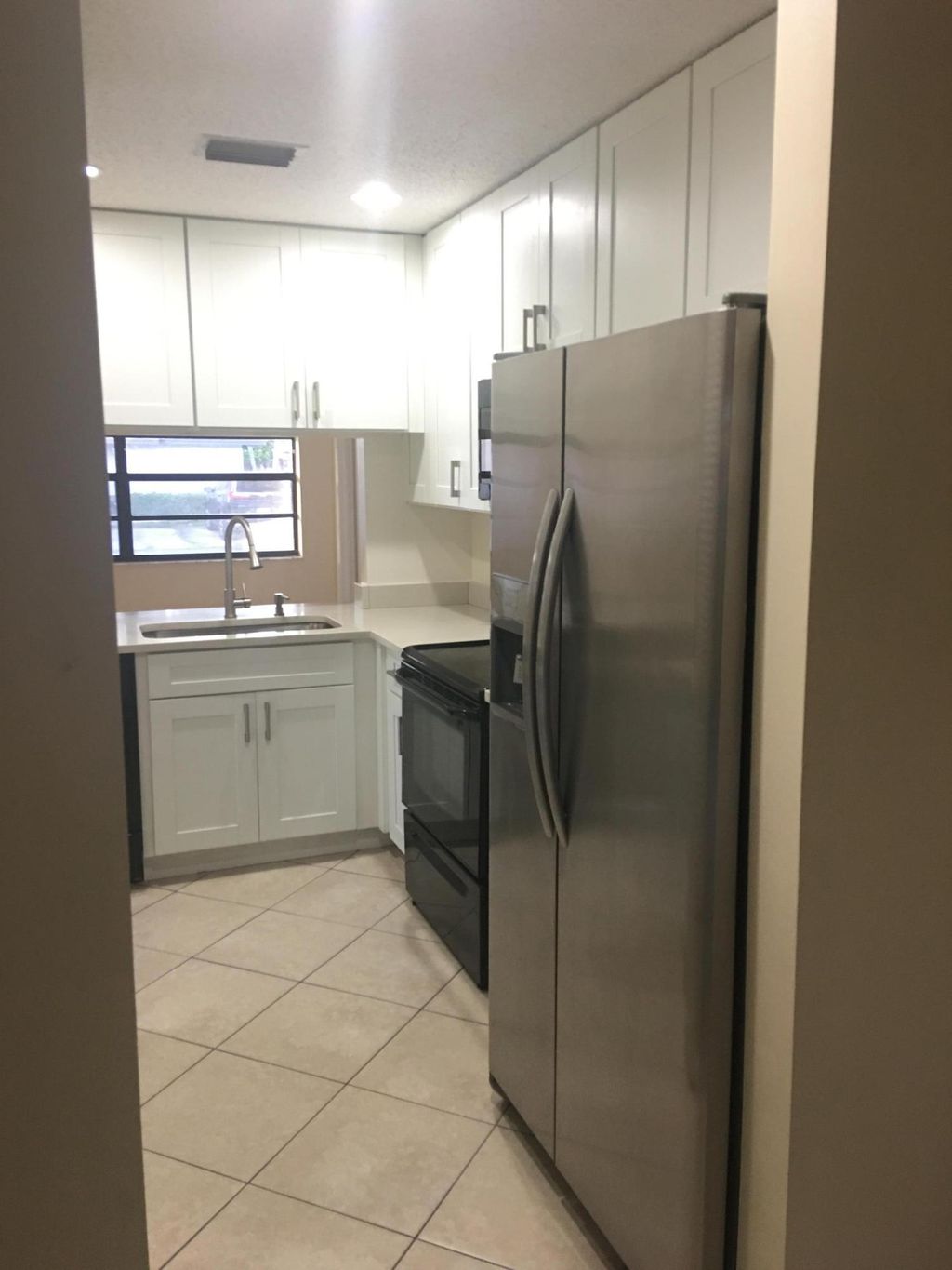 Photo of 1359 Pines Lane, West Palm Beach, FL 33415 (MLS # B26019131)