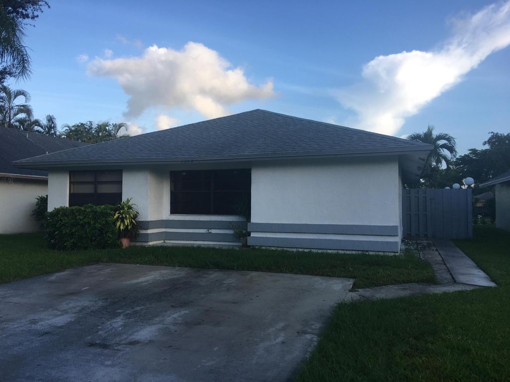 Photo of 1359 Pines Lane, West Palm Beach, FL 33415 (MLS # B26019131)