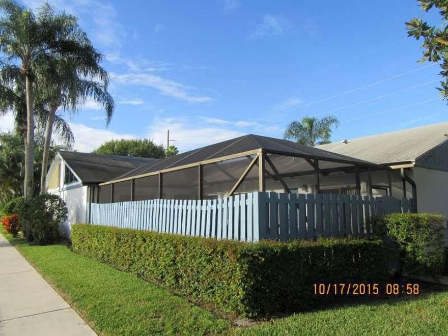 MUST SEE!! Beautiful villa with private pool. Wood plank tile throughout. The kitchen & master bathroom have been remodeled. New baseboards throughout, all new interior doors including closet doors, exterior has been freshly painted. Vaulted ceilings in the great room, kitchen, bedroom and master bedroom. Split floor plan. Furniture is negotiable. Security camera system included.