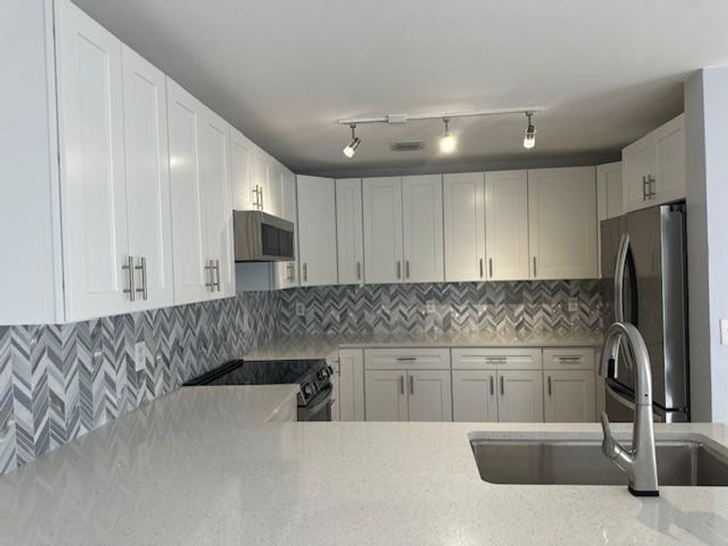 Photo of 4151 Eastridge Circle, Deerfield Beach, FL 33064 (MLS # F10533467)