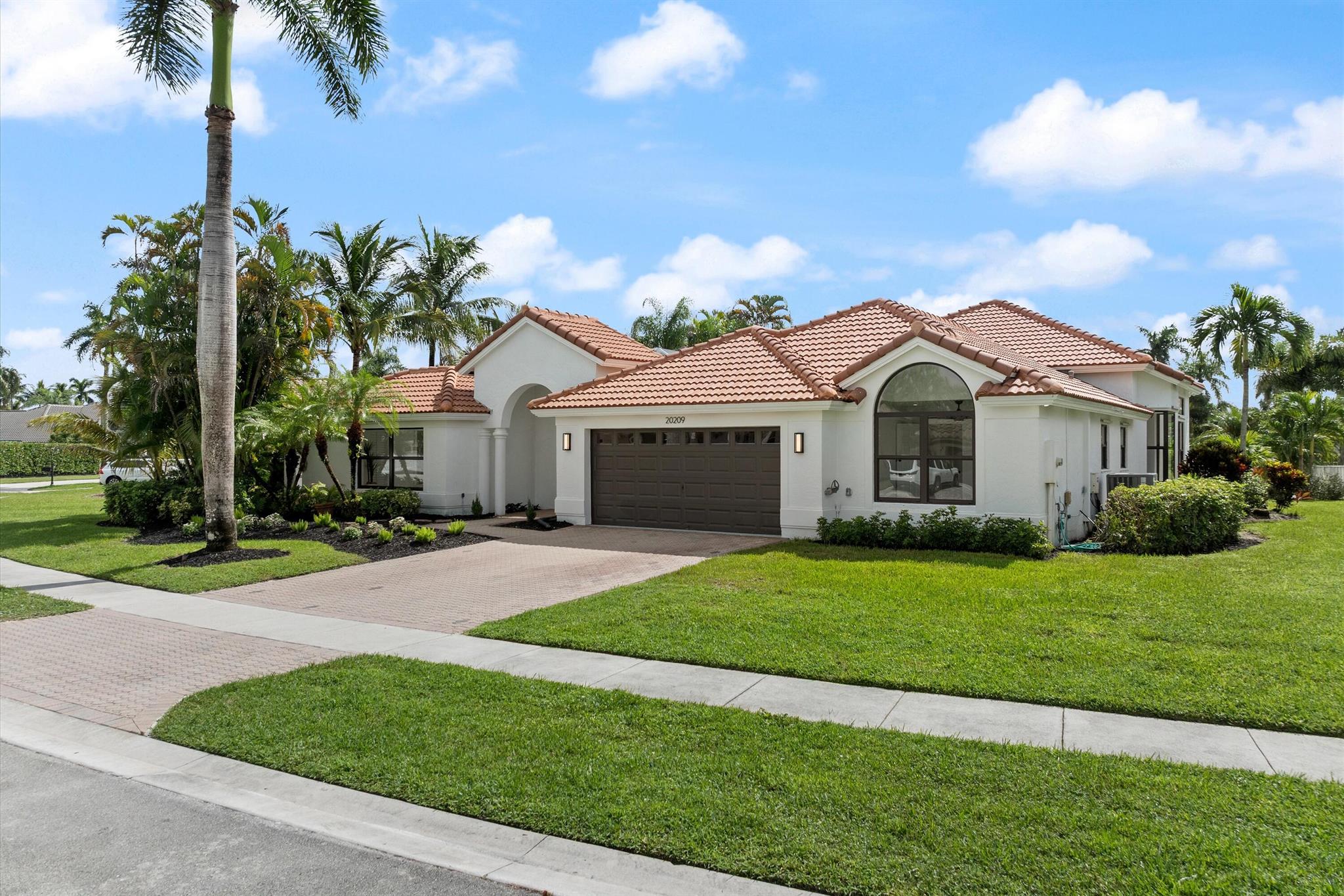 Welcome Home! Be the first to live in this fully renovated 4 Bed 3 Bath Oasis! This court yard home has been fully renovated from top to bottom. Step into the first entrance and be greeted by your private pool and hot tub. Then enter the home to be greeted by sprawling lake views, a custom kitchen, and full impact windows and doors throughout. The guest wing has a full bedroom and bath. Perfect for an office, guests/in-laws, pool house or bedroom. The possibilities are endless. If you want to feel like you're on vacation all the time this is the house for you.