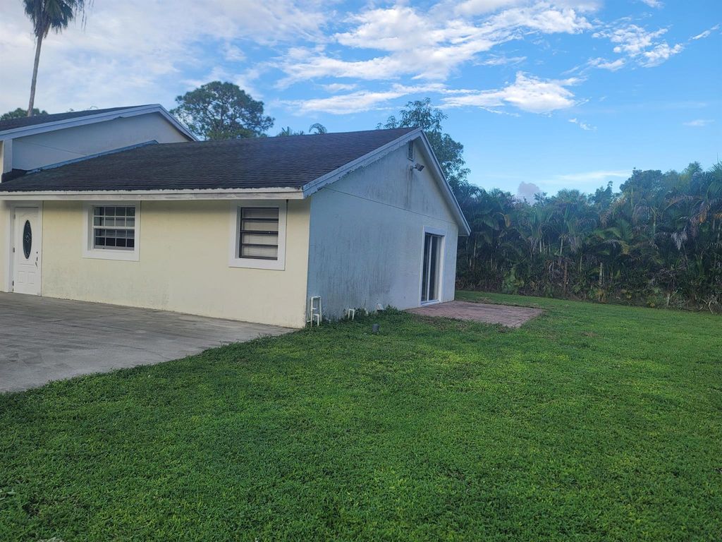 Photo of 15664 North Road #A, Loxahatchee Groves, FL 33470 (MLS # R11130416)