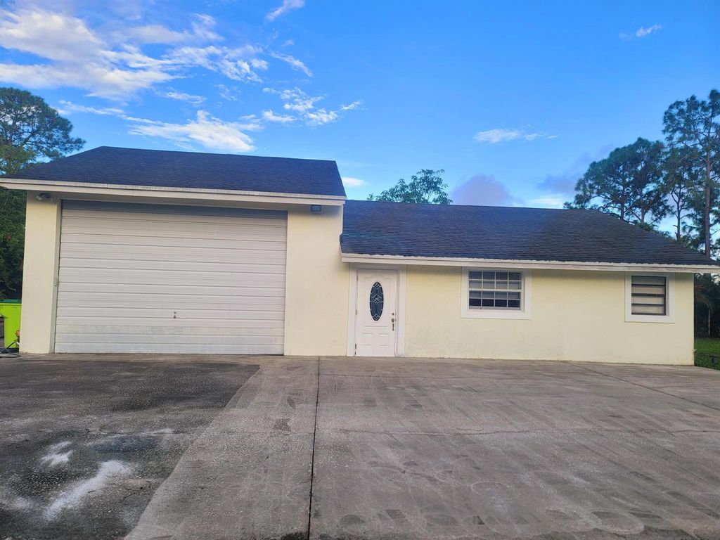Photo of 15664 North Road #A, Loxahatchee Groves, FL 33470 (MLS # R11130416)