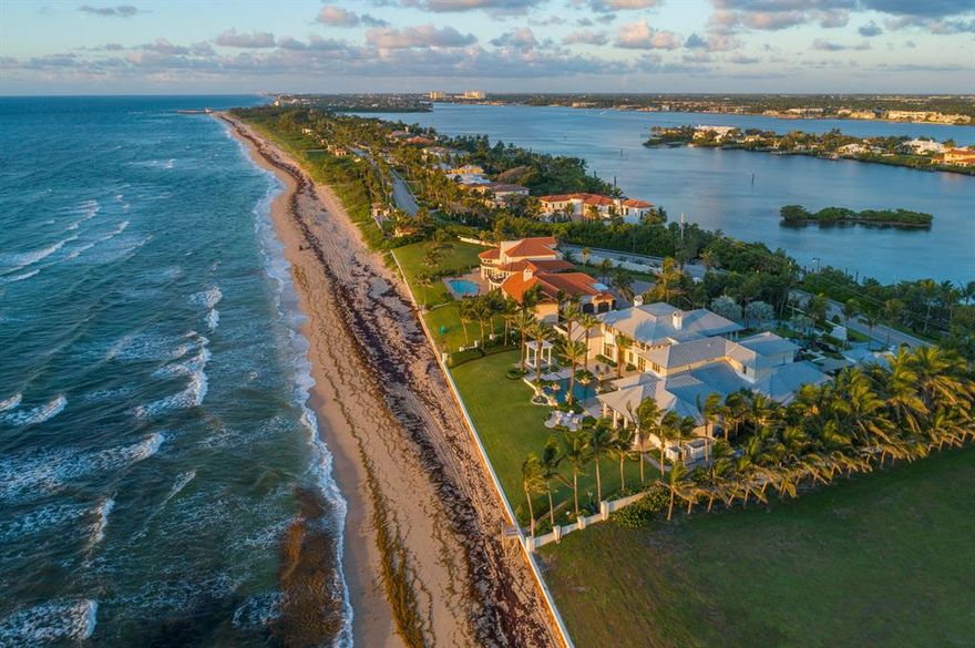 Flawless design, unparalleled construction & craftsmanship elevate this oceanfront masterpiece to a true work of art.  This gated 11,673 sf home designed by Randall Stofft Architects and constructed by Terry Cudmore Builders was crafted to be one of the finest estates in Palm Beach County. This impressive Ocean to Lake architectural marvel is sited on 178 feet of direct ocean waterfront providing a perfect panoramic experience of the best views living on the water has to offer.  The home offers 178 feet of Intracoastal waterfront with a 60 foot concrete dock complete with water and electricity.  This elegant estate encompasses 6 bedrooms, 9 full baths, 3 half baths, an Office, a Media/Club Room, Loft, Gym, Office, Elevator, Natural Gas, 4 car garage, Generator, Infinity Edge Pool and Spa.