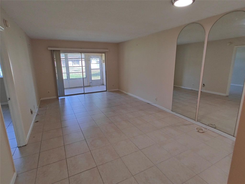 Photo of 606 SW Natura Boulevard #107, Deerfield Beach, FL 33441 (MLS # F10551889)