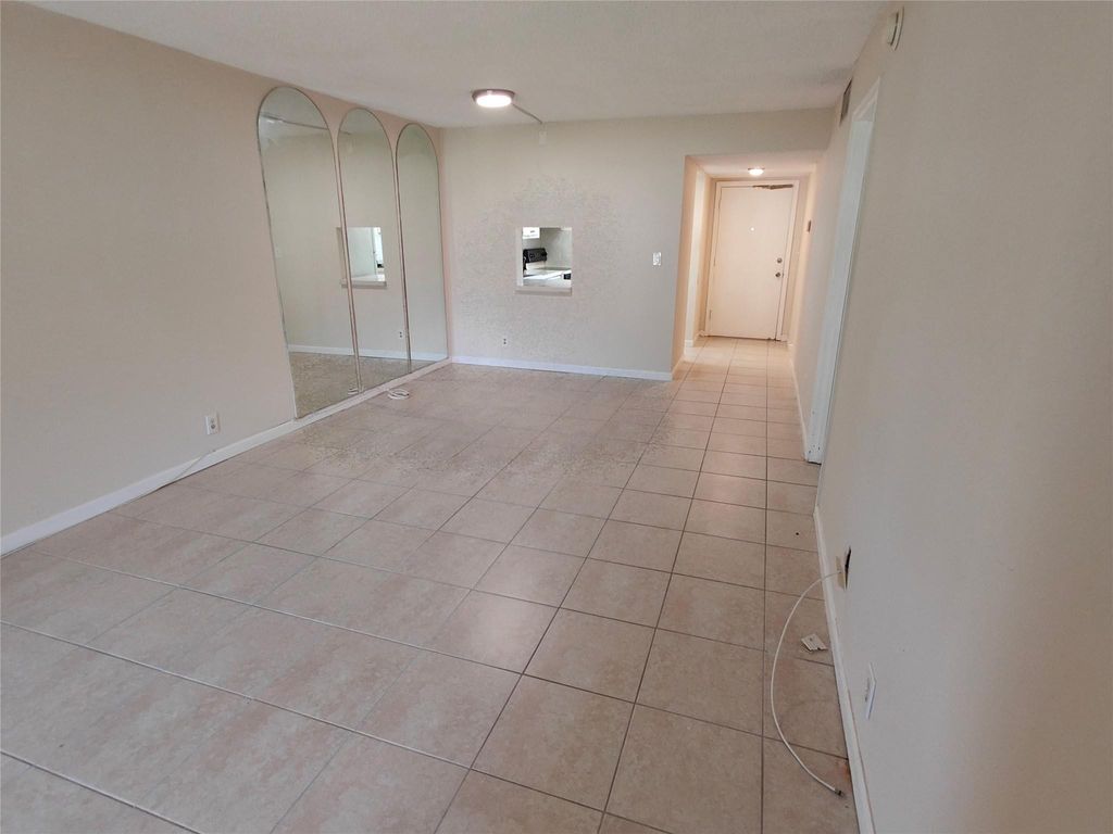 Photo of 606 SW Natura Boulevard #107, Deerfield Beach, FL 33441 (MLS # F10551889)