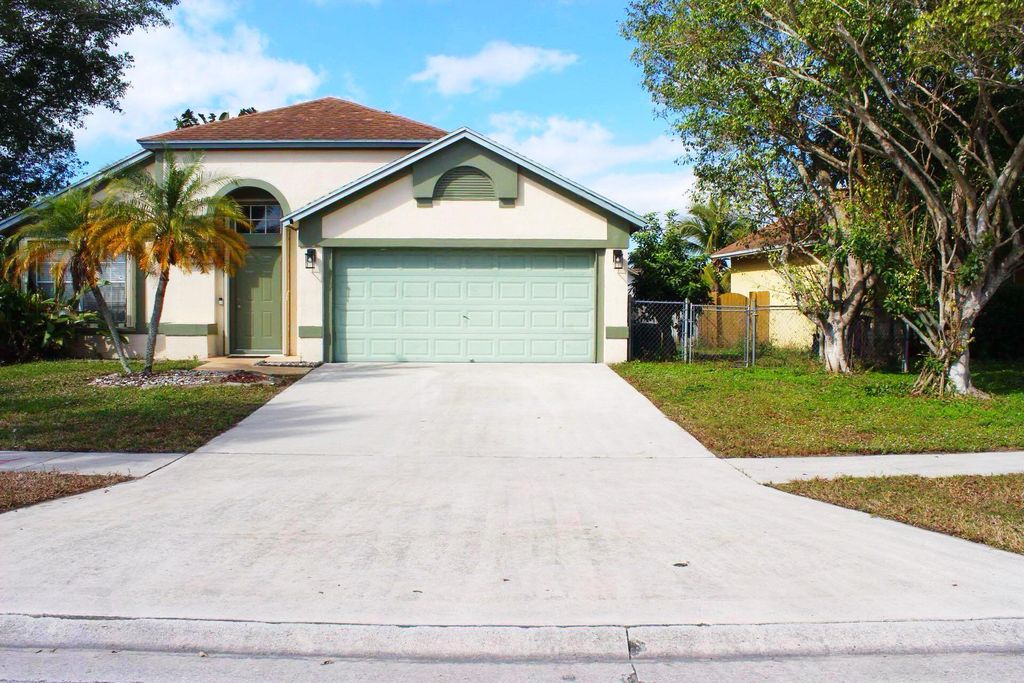Photo of 6325 Indian Wells Boulevard, Boynton Beach, FL 33437 (MLS # R11151210)